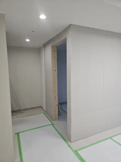 가벽공사 — 석고보드 가벽과 문틀 설치